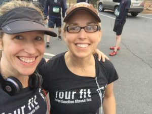 Kathryn and one of her best friends posing together during a 5K race