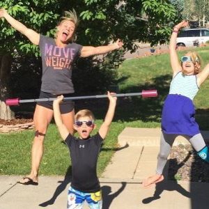FiTness Testimony from a Professional Athlete, a mom with her son and daughter posing after a workout together in their front yard
