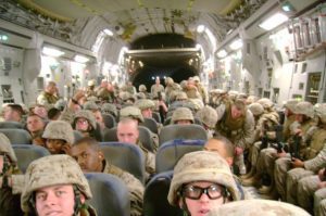 Testimony from Combat Warrior, Matthew Thomas, Matthew sitting in an aircraft with several other marines