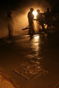 Testimony from Combat Warrior, Matthew Thomas, nighttime shot of soliders working in the street