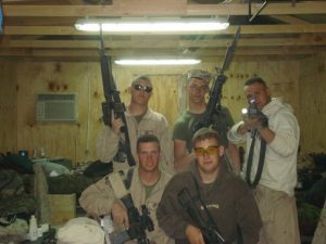 Testimony from Combat Warrior, Matthew Thomas, group of soldiers with their guns