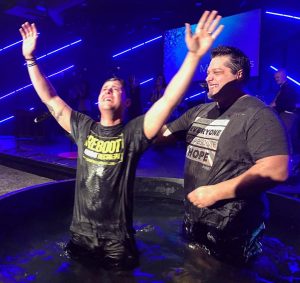 Testimony from Combat Warrior, Matthew Thomas, Matthew right after being baptized with his hands raised
