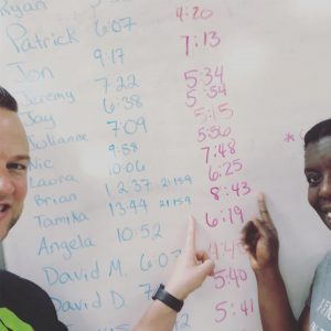 Pastor Brian Duley's FiT-Testimony, Brian and his wife Tamika pointing to their vast improvement on their workout test at graduation