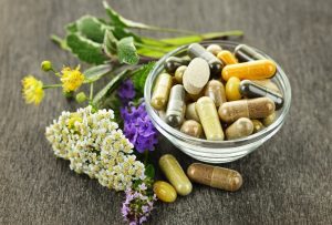 3-2-1-Go to Sleep! Here's Why... (Part 5), photo of pills in a bowl with flowers next to it.